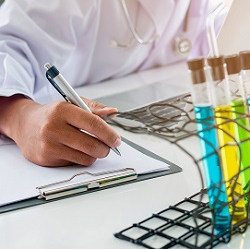 lab scientist with clipboard