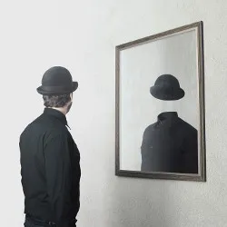 man in a bowler hat looks into a mirror in Magritte-style image