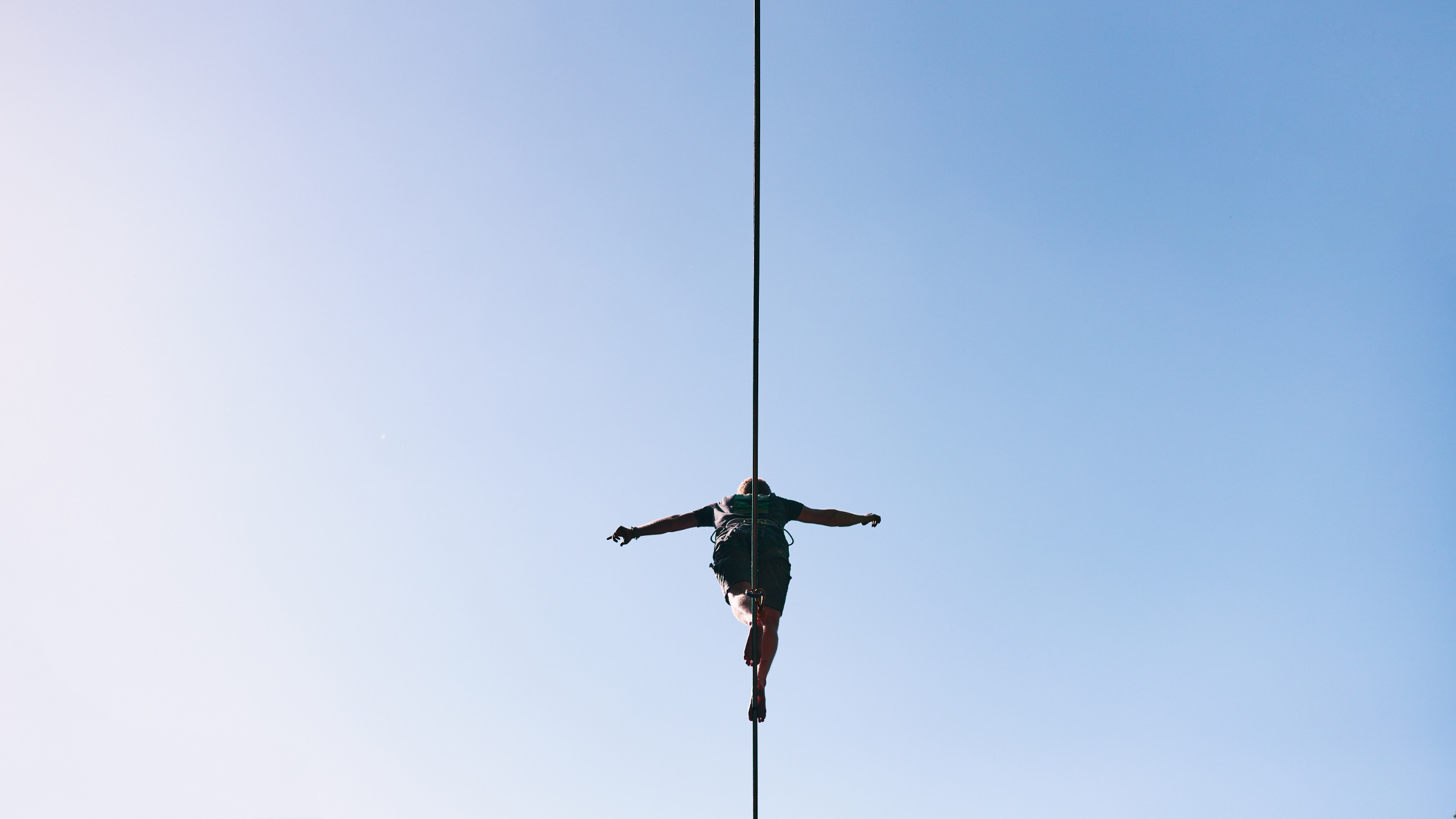 aerialist on a tightrope
